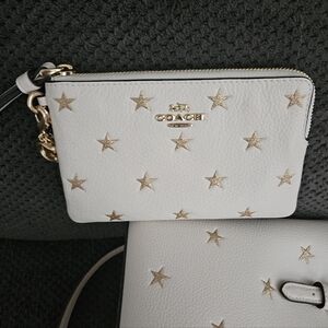 Coach White Wristlet with Gold Stars